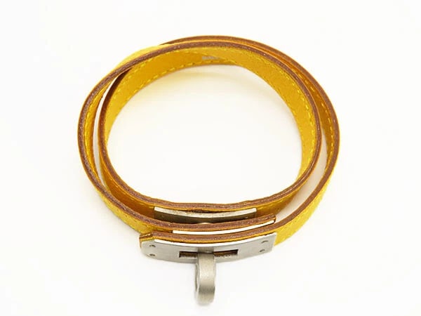 HERMES KELLY DOUBLE TOUR BRACELET STAR MARK YELLOW SILVER LEATHER: Hermes Kelly Double Tour Bracelet Star Mark Yellow Silver Leather Brand: HERMES Type/Style: Bracelet Material: Leather, Color: Yellow GOLD Size: Total length approx. 36.5cm Thickness: 1.3cm Arm circum