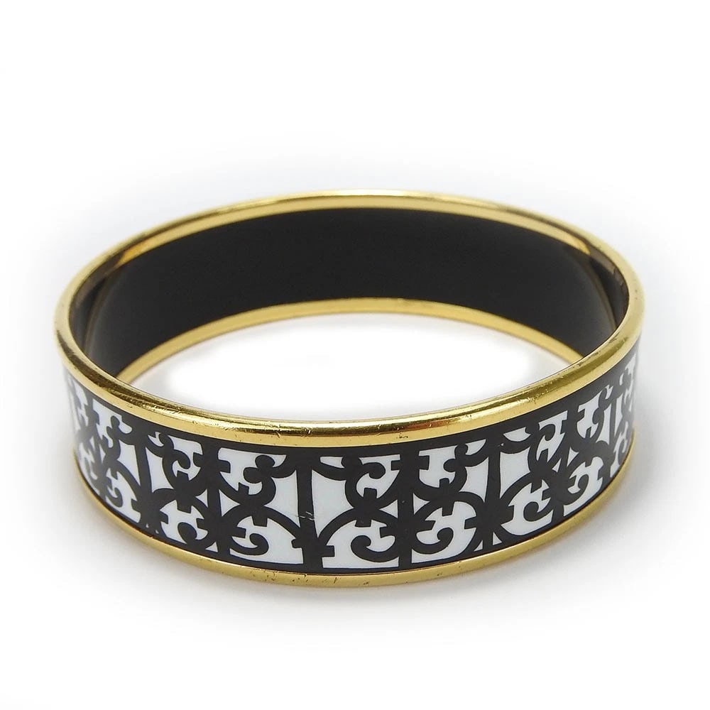 HERMES ENAMEL GADALQUIVIR WHITE X BLACK X GOLD: Hermes Enamel Gadalquivir White x Black x Gold Brand: Hermes Type/Style: Bracelet Material: Enamel and metal, Color: White / Black Size: Width: approx. 1.8 cm Internal circumference: approx. 19 cm