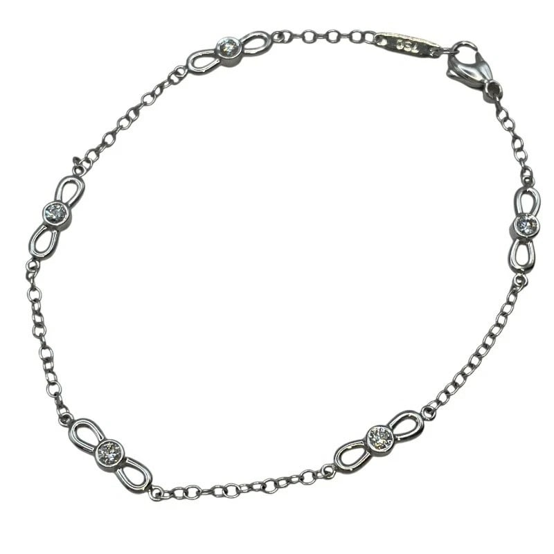 TIFFANY & CO. BOW BRACELET WHITE GOLD 750: Tiffany & Co. Bow Bracelet White Gold 750 Brand: Tiffany & Co. Type/Style: Bracelet Material: 18K WG Color: WG Size: Size Arm circumference: Approximately 18cm Accessories: None Accessories Notice: