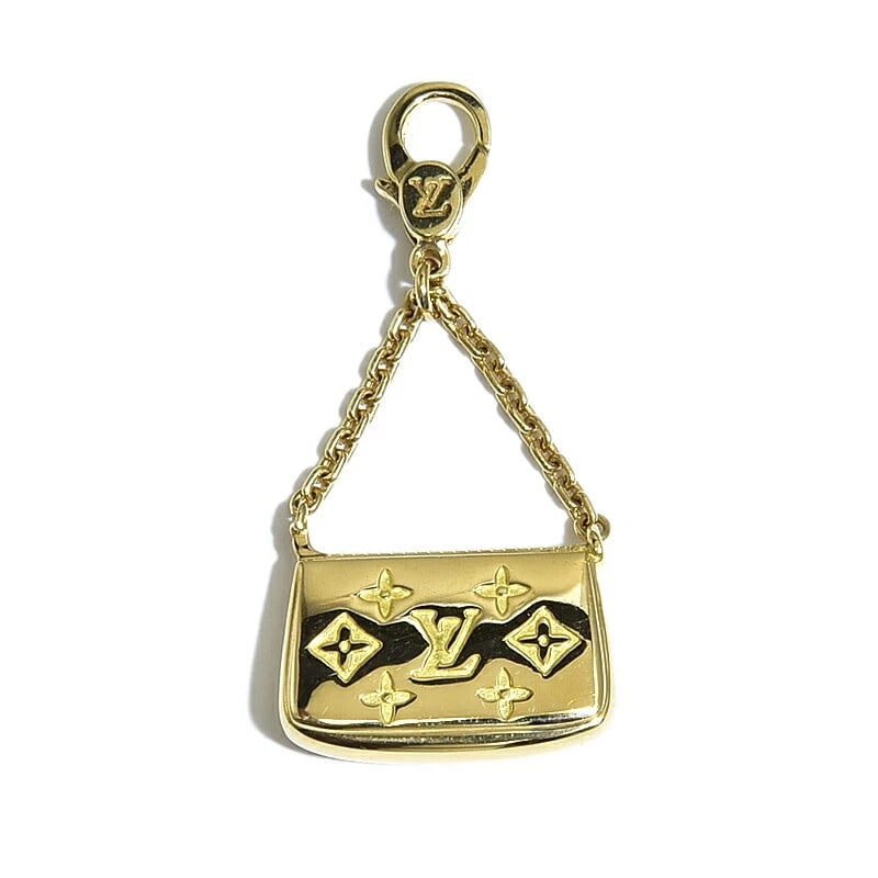 LOUIS VUITTON LV CHARM DE MONOGRAM POCHETTE: Louis Vuitton Lv Charm de Monogram Pochette Brand: Louis Vuitton Lv Type/Style: Bracelet Material: 18K YG Color: YG Size: Size Chain length 3cm Chain width 1.4mm Motif 16.4mm x 13.6mm (including Vatic