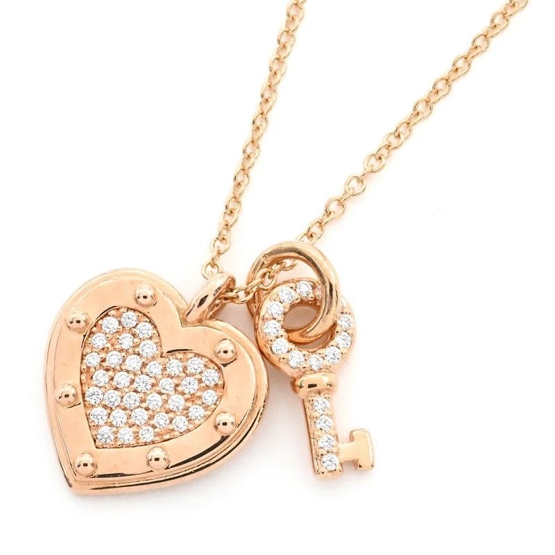 TIFFANY & CO. RETURN TO TIFFANY HEART TAG KEY DIAMOND NECKLACE: Tiffany & Co. Return to Tiffany Heart Tag Key Diamond Necklace Brand: Tiffany & Co. Type/Style: Pendant Material: 18K PG Color: PG Size: Size Effective length 40cm/45cm Chain width 0.6mm Motif 12.2mm