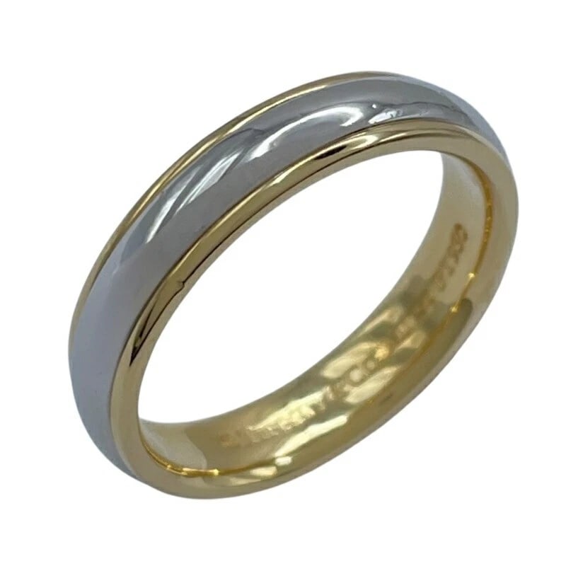 TIFFANY & CO. LUCIDA BAND RING PLATINUM JEWELRY: Tiffany & Co. Lucida Band Ring Platinum Jewelry Brand: Tiffany & Co. Type/Style: Ring Material: 18K YG Pt950 Color: YG PT Size: 5 US Accessories: None Accessories Notice: When purchasing p