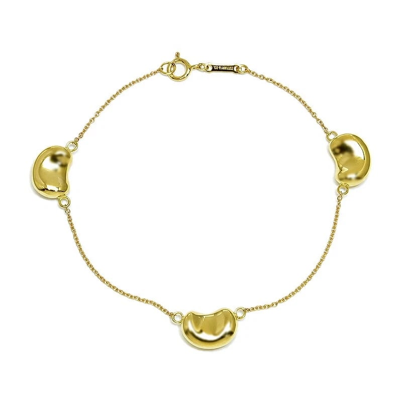 TIFFANY & CO. BEAN DESIGN BRACELET 18K: Tiffany & Co. Bean Design Bracelet 18K Brand: Tiffany & Co. Type/Style: Bracelet Material: 18K YG Color: YG Size: Size Inner circumference 17cm Chain width 0.9mm Motif 14.0mm to 14.5mm (including Vati