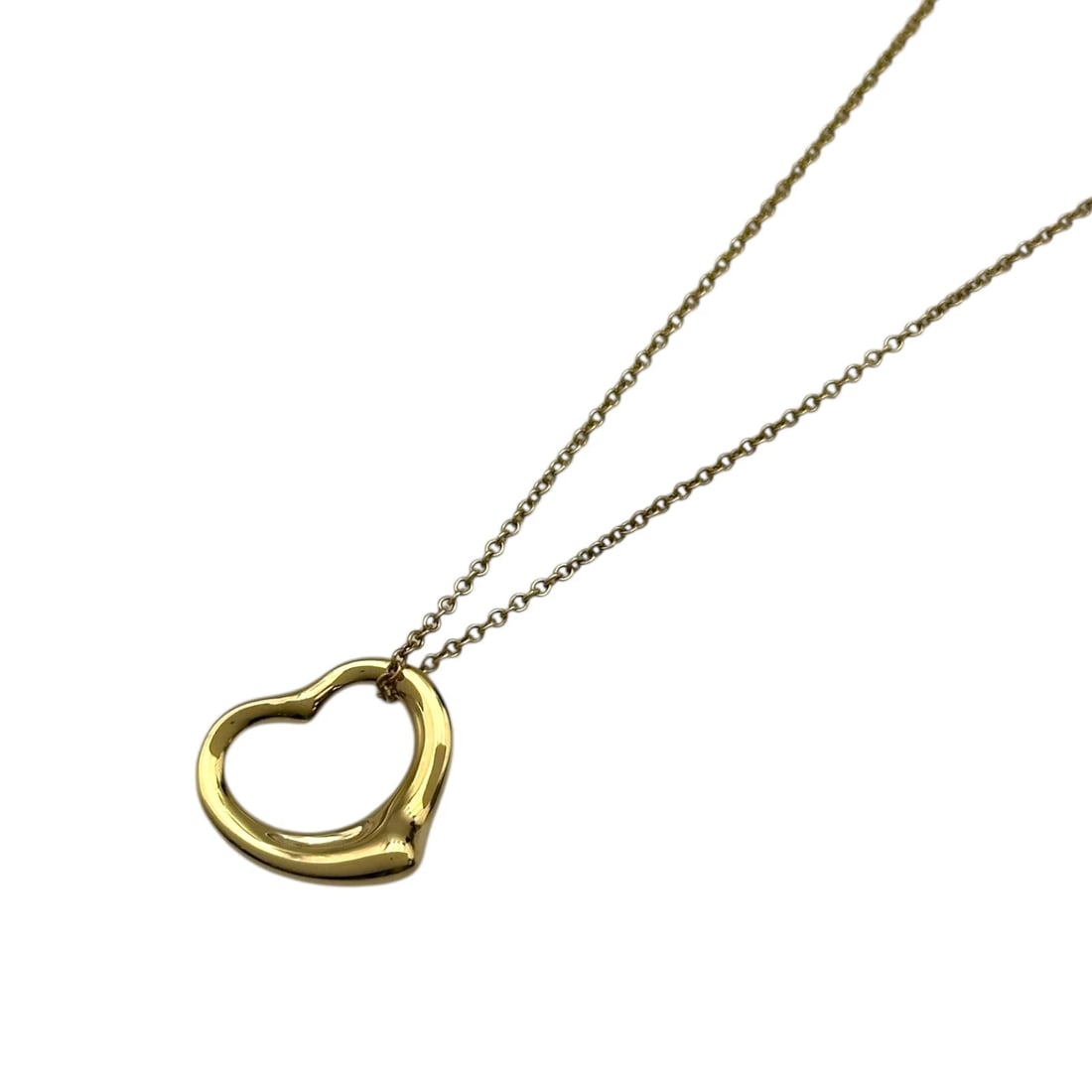TIFFANY & CO. OPEN HEART NECKLACE GOLD 750 JEWELRY: Tiffany & Co. Open Heart Necklace Gold 750 Jewelry Brand: Tiffany & Co. Type/Style: Necklace Material: 18K YG Color: YG Size: Size Height: approx. 13.4mm Width: approx. 15.2mm Chain length: approx. 40