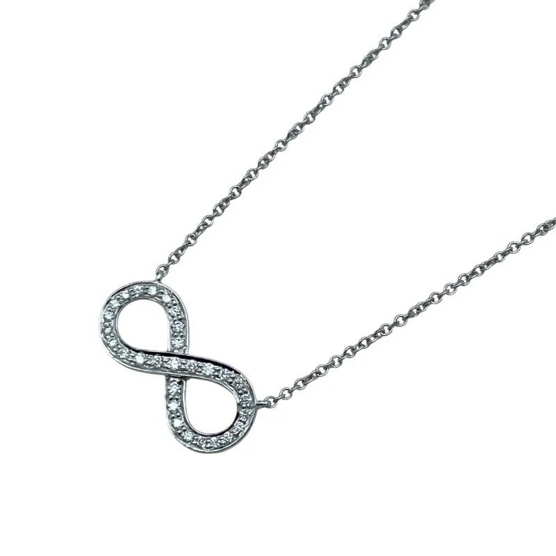 TIFFANY & CO. INFINITY DIAMOND NECKLACE PLATINUM: Tiffany & Co. Infinity Diamond Necklace Platinum Brand: Tiffany & Co. Type/Style: Necklace Material: Pt950 Color: PT Size: Size Height: approx. 8.4mm Width: approx. 16.7mm Chain length: approx. 40cm