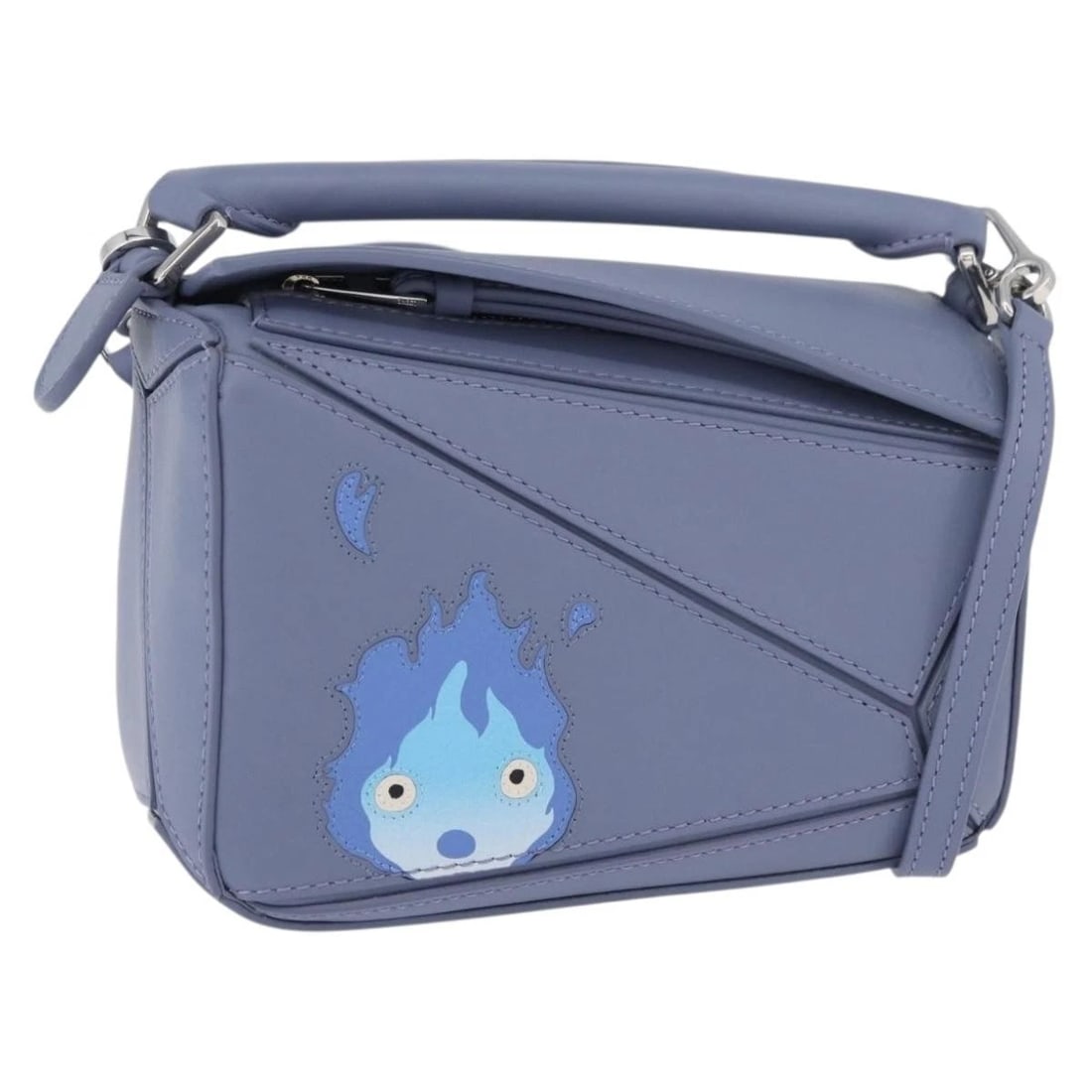 LOEWE ? STUDIO GHIBLI HOWL'S MOVING CASTLE CALCIFER: LOEWE ? Studio Ghibli Howl's Moving Castle Calcifer Brand: LOEWE Type/Style: Hand Bag Material: Leather Color: Light Blue/Silver Size: W6.7 x H3.9 x D2.8inch(Approx) Accessories: None Acce