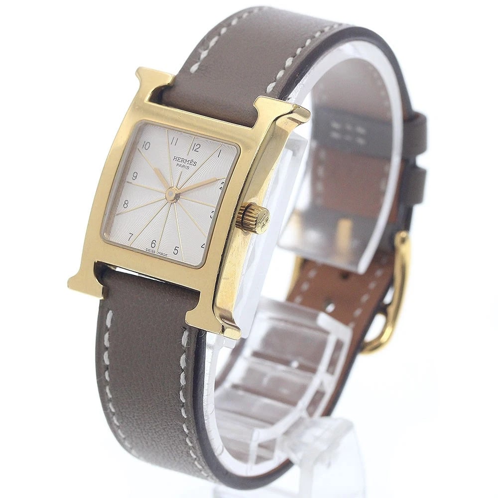 HERMES H WATCH WHITE DIAL QUARTZ WATCH: HERMES H watch white Dial Quartz Watch Brand: HERMES Type/Style: Wristwatch Material: Band Material leather, Case Material Stainless Steel/Gold Plated Color: Dial Color white Size: Case Size