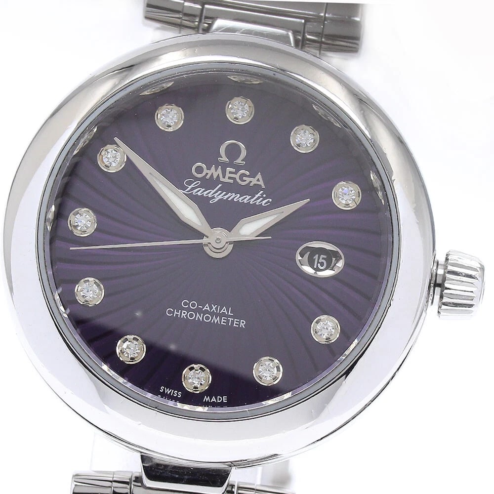OMEGA DE VILLE LADYMATIC DIAMOND AT WATCH: OMEGA De Ville Ladymatic Diamond AT Watch Brand: OMEGA Type/Style: Wristwatch Material: Band Material Stainless Steel, Case Material Stainless Steel Color: Dial Color purple Size: Case Size About34mm