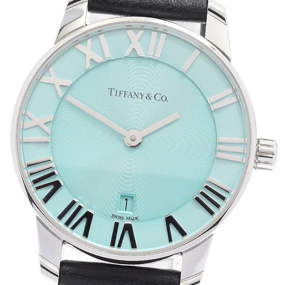 TIFFANY&CO. ATLAS DATE BLUE DIAL QUARTZ WATCH: TIFFANY&Co. Atlas Date blue Dial Quartz Watch Brand: TIFFANY&Co. Type/Style: Wristwatch Material: Band Material leather, Case Material Stainless Steel Color: Dial Color blue Size: Case Size About29mm