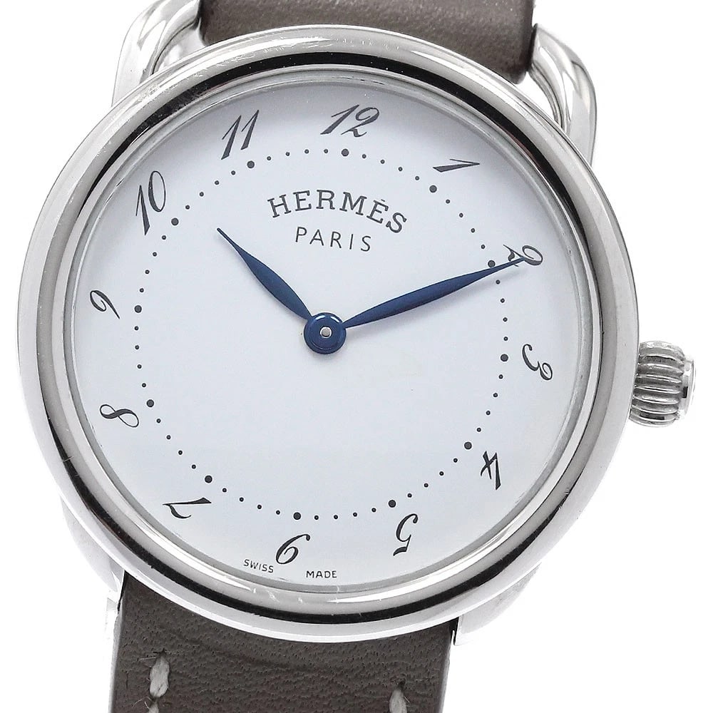 HERMES ARCEAU WHITE DIAL QUARTZ WATCH: HERMES Arceau White Dial Quartz Watch Brand: HERMES Type/Style: Wristwatch Material: Band Material leather, Case Material Stainless Steel Color: Dial Color white Size: Case Size About28mm (1.1inch)