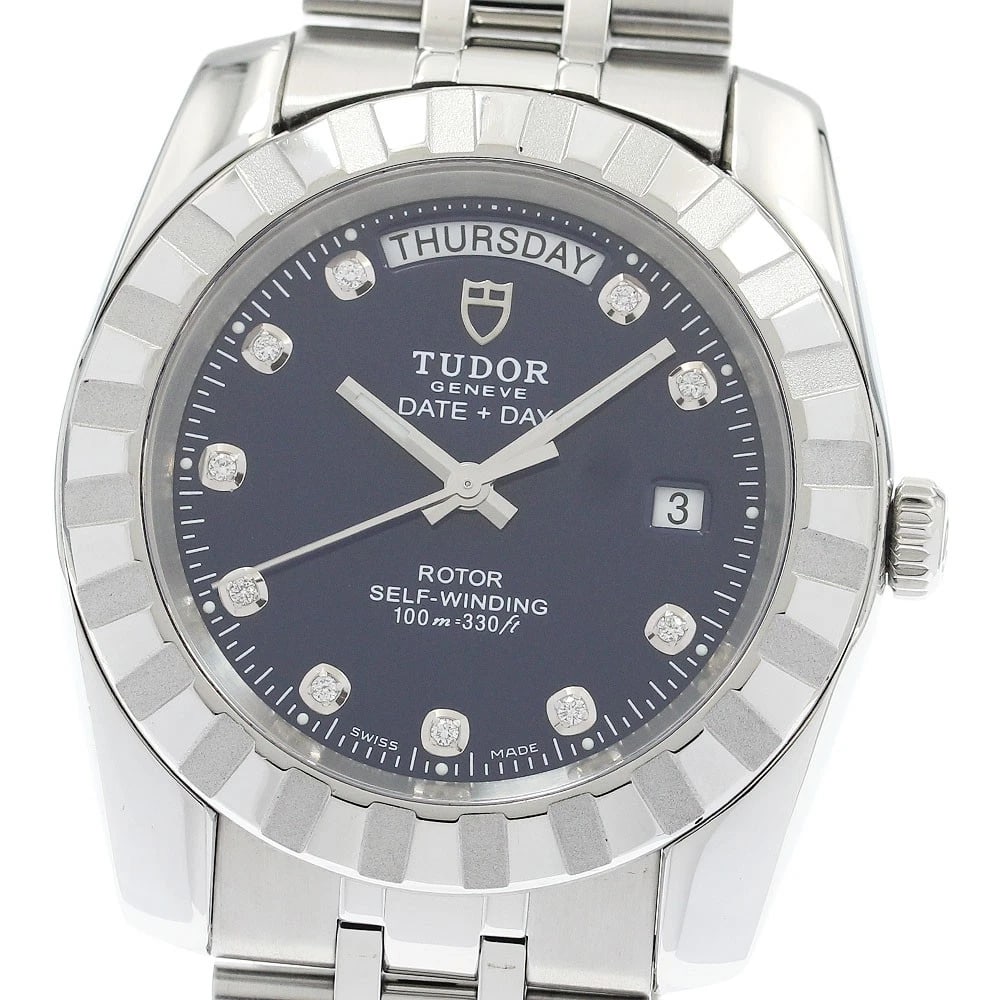 TUDOR CLASSIC DATE DAY DIAMOND NAVY DIAL AUTOMATIC WATCH: TUDOR Classic Date Day diamond Navy Dial Automatic Watch Brand: TUDOR Type/Style: Wristwatch Material: Band Material Stainless Steel, Case Material Stainless Steel Color: Dial Color Silver Size: Case