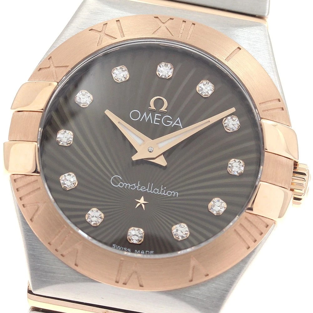 OMEGA CONSTELLATION DIAMONDS QUARTZ WATCH: OMEGA Constellation diamonds Quartz Watch Brand: OMEGA Type/Style: Wristwatch Material: Band Material Stainless Steel/RG, Case Material Stainless Steel/RG Color: Dial Color Brown Size: Case Size