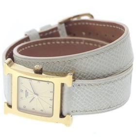 HERMES H WATCH DOUBLE TOUR GOLD DIAL QUARTZ WATCH: HERMES H watch Double Tour Gold Dial Quartz Watch Brand: HERMES Type/Style: Wristwatch Material: Band Material leather, Case Material Stainless Steel/Gold Plated Color: Dial Color gold Size: Case