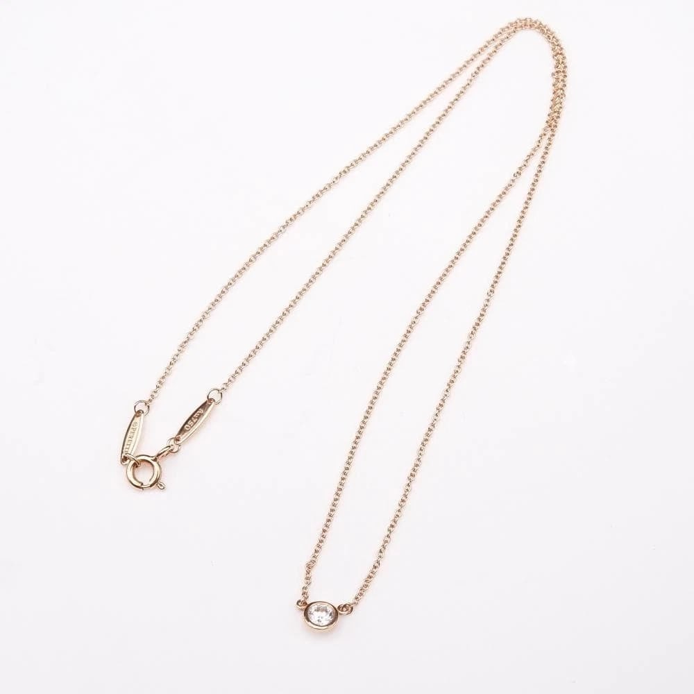 TIFFANY & CO. DIAMONDS BY THE YARD NECKLACE 18K GOLD: Tiffany & Co. Diamonds By the Yard Necklace 18K Gold Brand: Tiffany & Co. Type/Style: Necklace Material: K18PG 750 (Pink Gold) / 1 Diamond, Color: GOLD Size: Pendant: Approx. 4.9mm W, Chain Length: 41