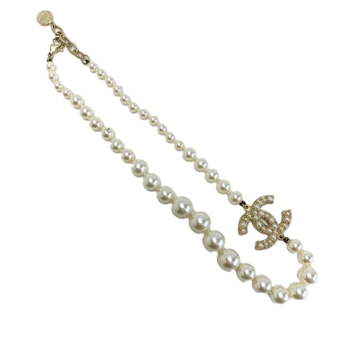 CHANEL COCO MARK PEARL RHINESTONE: CHANEL Coco Mark Pearl Rhinestone Brand: CHANEL Type/Style: Pendant Material: Rhinestones, Main Stone/Creation pearl Secondary Stone Rhinestones Color: Size: Total Length Approx. 45 cm Accessories