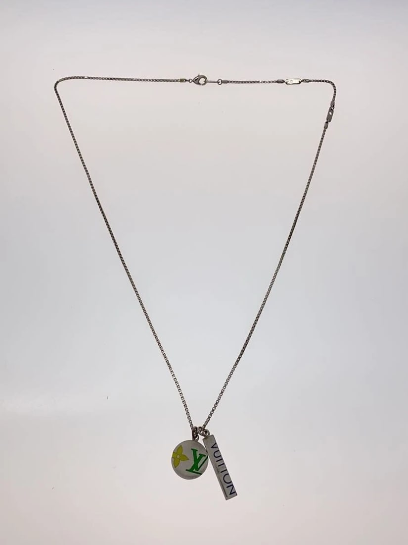 LOUIS VUITTON MONOGRAM PLAY NECKLACE SILVER: LOUIS VUITTON Monogram Play Necklace Silver Brand: Louis Vuitton Type/Style: Pendant Material: NONE, Color: SILVER Size: Actual Size Necklace Length: 65.5 / Length: 2.5/3.5 / Width: 1.7/0.5 Access