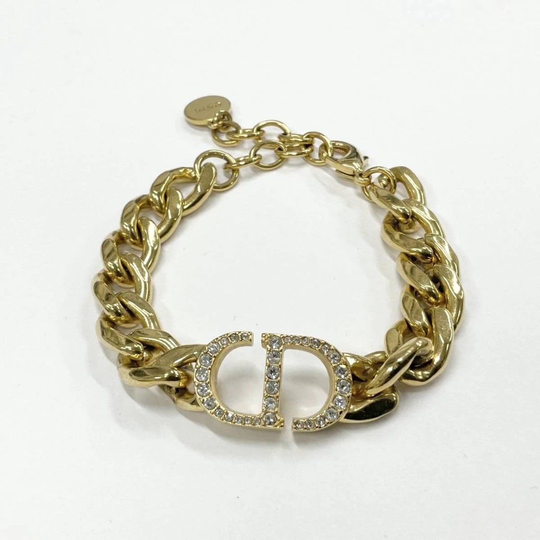 CHRISTIAN DIOR 30 MONTAIGNE CD LOGO RHINESTONE CHAIN BRACELET GOLD: Christian Dior 30 Montaigne CD Logo Rhinestone Chain Bracelet Gold Brand: Christian Dior Type/Style: Bracelet Material: Gold, Rhinestones, Color: Gold Size: Length approx. 17-20.5cm Accessories: N