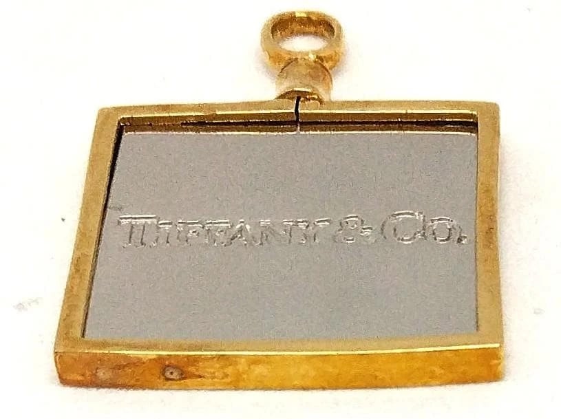TIFFANY & CO. CHARM SILVER GOLD PENDANT TOP K18 PT900: Tiffany & co. charm Silver Gold pendant top K18 Pt900 Brand: Tiffany & co Type/Style: Pendant Top Material: Platinum Pt900, Color: Silver Gold Silver Gold Size: Length approx. 2.9 cm, Width approx. 1.