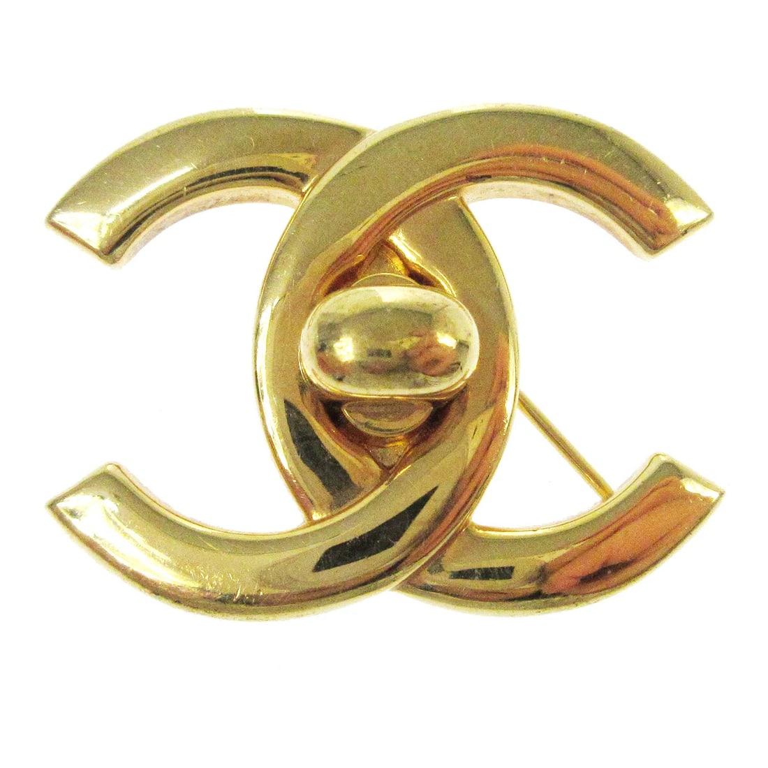 CHANEL TURNLOCK BROOCH PIN GOLD LARGE 96P: Chanel Turnlock Brooch Pin Gold Large 96P Brand: Chanel Type/Style: Brooch Material: Gold-tone Color: gold Size: W 3.8 x H 2.8 cm Accessories: None Accessories Notice: When purchasing pre-