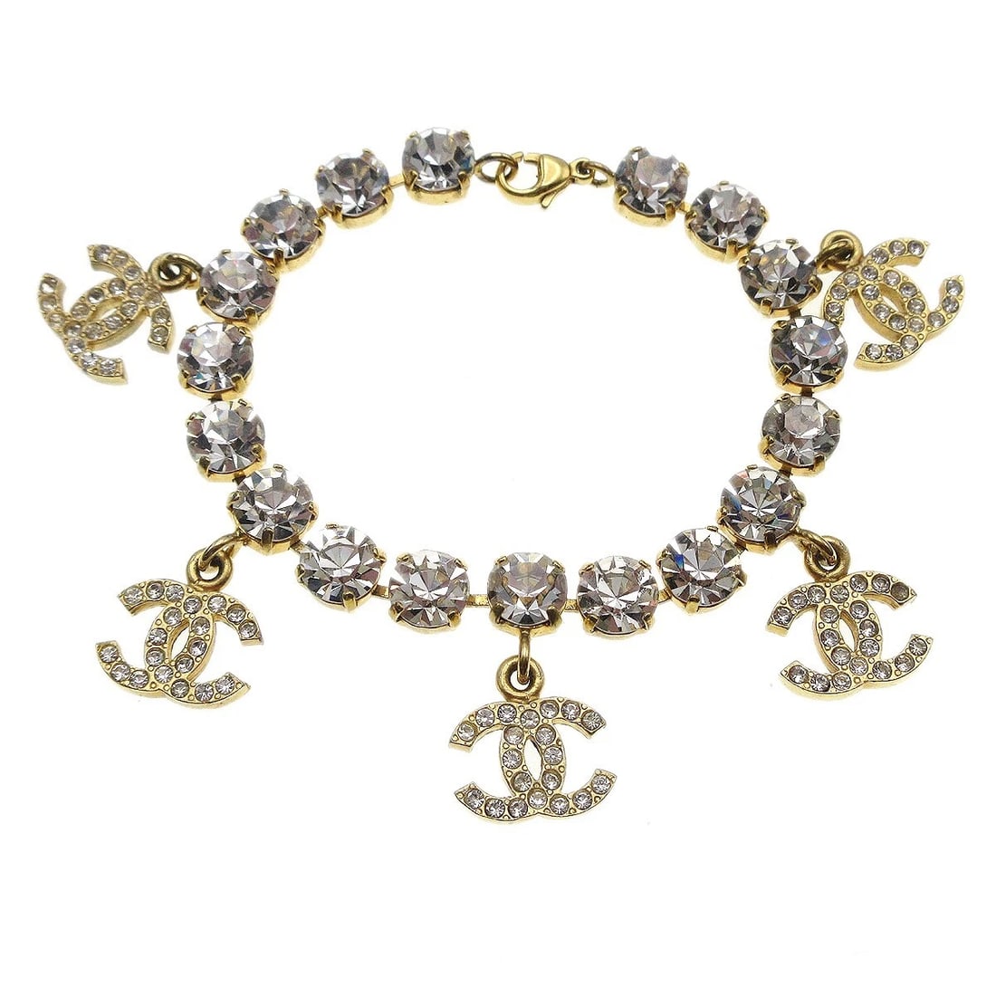 CHANEL RHINESTONE CHAIN BRACELET GOLD: Chanel Rhinestone Chain Bracelet Gold Brand: CHANEL Type/Style: Bracelet Material: Gold Plated Rhinestone Color: gold Size: Inner circumference : 19.5 cmCharm : W 1.5 x H 1.2 cm Accessories: None