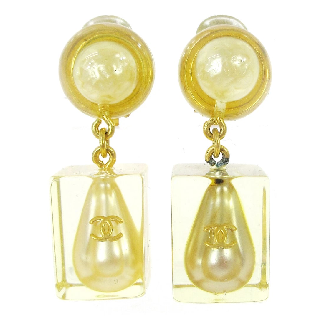 CHANEL ACRYLIC ARTIFICIAL PEARL DANGLE EARRINGS CLIP-ON: Chanel Acrylic Artificial Pearl Dangle Earrings Clip-On Brand: Chanel Type/Style: Earrings Material: Gold Plated Acrylic, Main Stone Pearl Color: gold Size: W 1.4 x H 4.2 cm Accessories: None