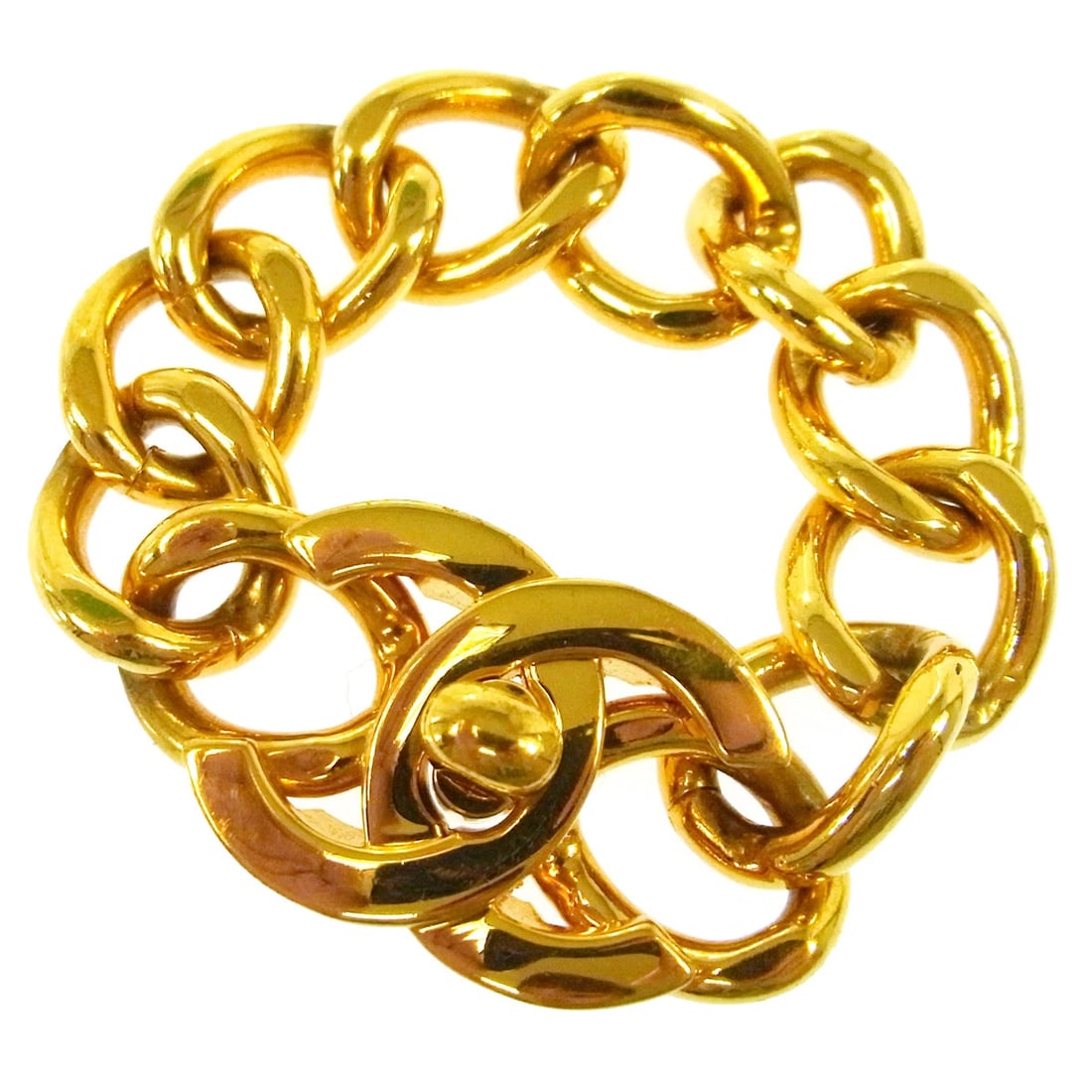 CHANEL GOLD TURNLOCK CHAIN BRACELET: Chanel Gold Turnlock Chain Bracelet Brand: Chanel Type/Style: Bracelet Material: Gold Plated Color: gold Size: Inner circumference : 19.0 cmCharm : W 3.5 x H 2.8 cm Accessories: None Acces