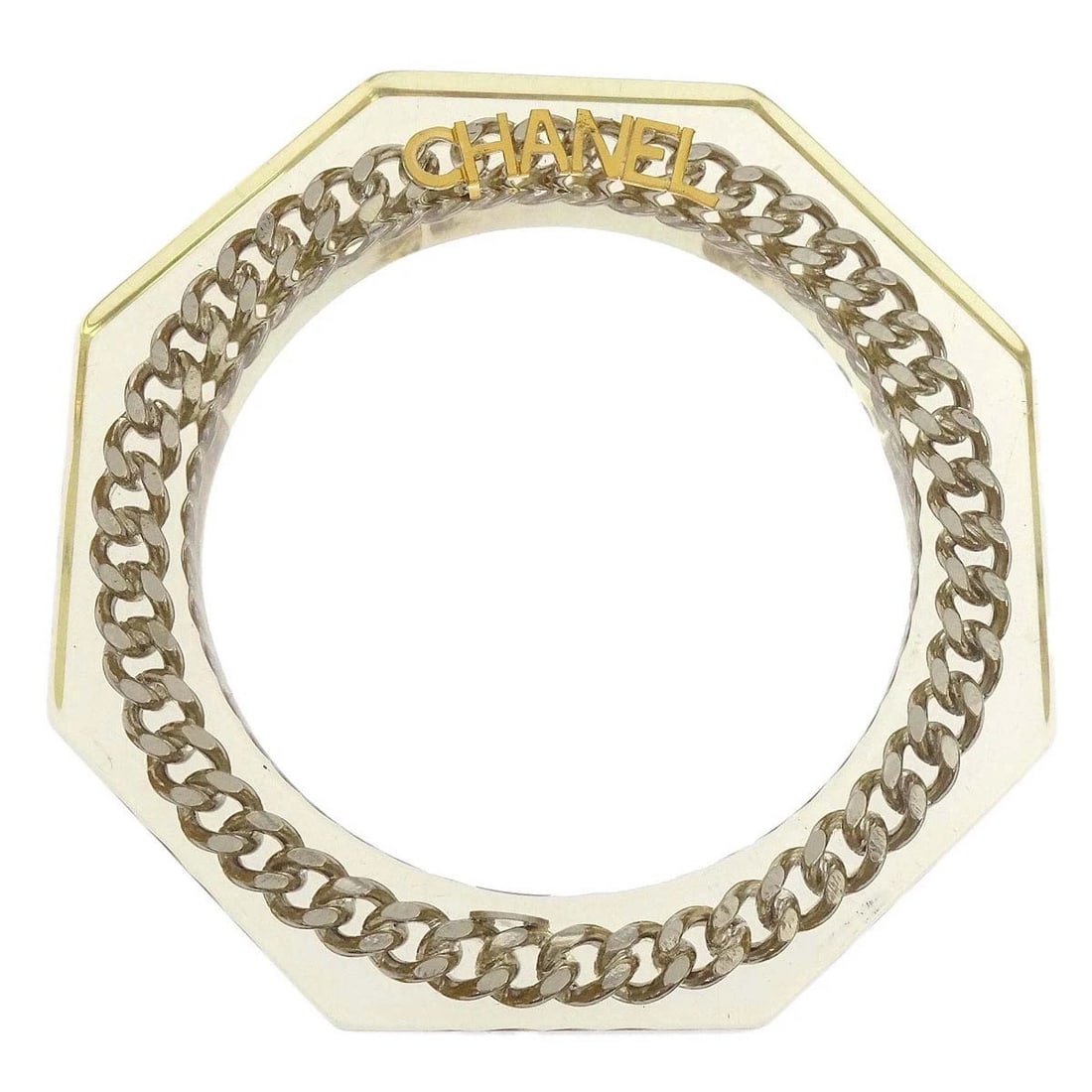 CHANEL CLEAR ACRYLIC BANGLE: Chanel Clear Acrylic Bangle Brand: Chanel Type/Style: Bracelet Material: Gold Plated Acrylic Color: clear Size: Inner circumference : 20.0 cmWidth : 1.0 cm Accessories: None Accessories No
