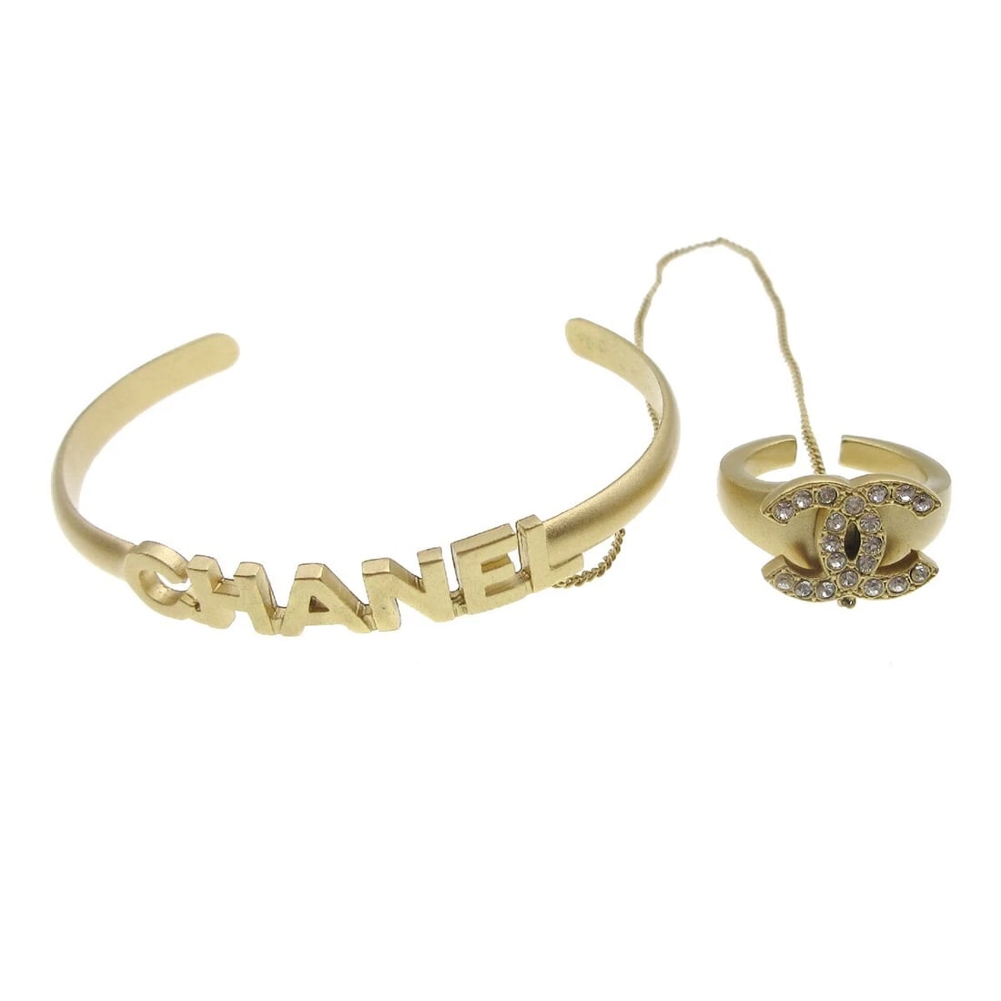 CHANEL GOLD RHINESTONE BANGLE CHAIN RING: Chanel Gold Rhinestone Bangle Chain Ring Brand: CHANEL Type/Style: Bracelet Material: Gold Plated Rhinestone Color: gold Size: US 4 Accessories: None Accessories Notice: When purchasing pr