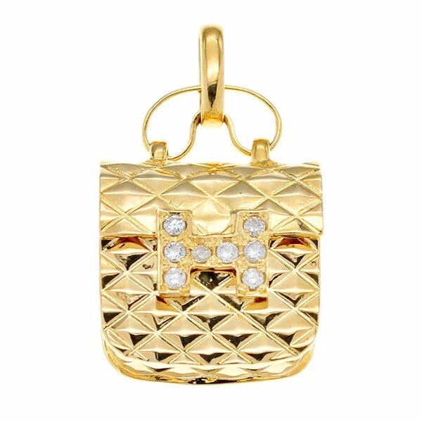 18K YG BAG MOTIF DIAMOND PENDANT TOP: 18K YG Bag Motif Diamond Pendant Top Brand: Unbranded Type/Style: Pendant Material: 18K YG Color: YG Size: Size Total length (including Vatican): Approx. 30mm Motif size: Approximately W18mm x H26mm V