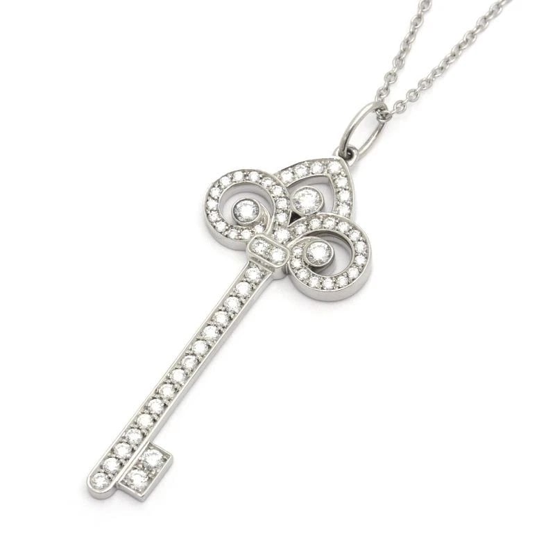 TIFFANY & CO. KEY FLEUR DORIS KEY PENDANT: Tiffany & Co. Key Fleur Doris Key Pendant Brand: Tiffany & Co. Type/Style: Pendant Material: Pt950 Color: PT Size: Size Effective length 45.5cm Chain width 0.9mm Motif 15.0mm x 41.0mm (including