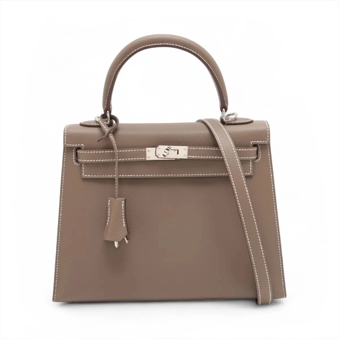 HERMES KELLY 25 SERIE VEAU EPSOM ETOUPE SILVER METAL: Hermes Kelly 25 Serie Veau Epsom Etoupe Silver Metal Brand: Hermes Type/Style: Hand bag Material: Veau Epsom Color: Etoupe Size: Height:7.1inchLength:9.8inchDepth:3.9inch Accessories: None