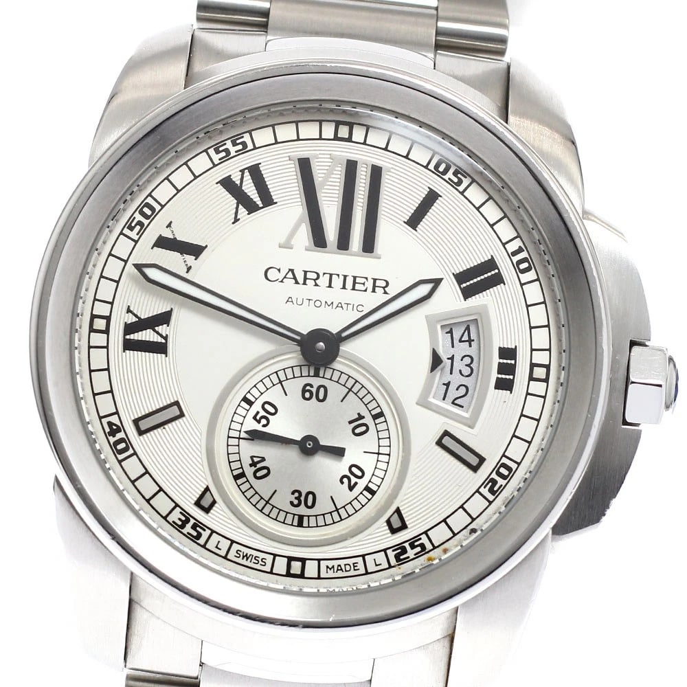 CARTIER CALIBRE DATE AUTOMATIC WATCH: CARTIER Calibre Date Automatic Watch Brand: CARTIER Type/Style: Wristwatch Material: Band Material Stainless Steel, Case Material Stainless Steel Color: Dial Color Silver Band Color Silver Case Color