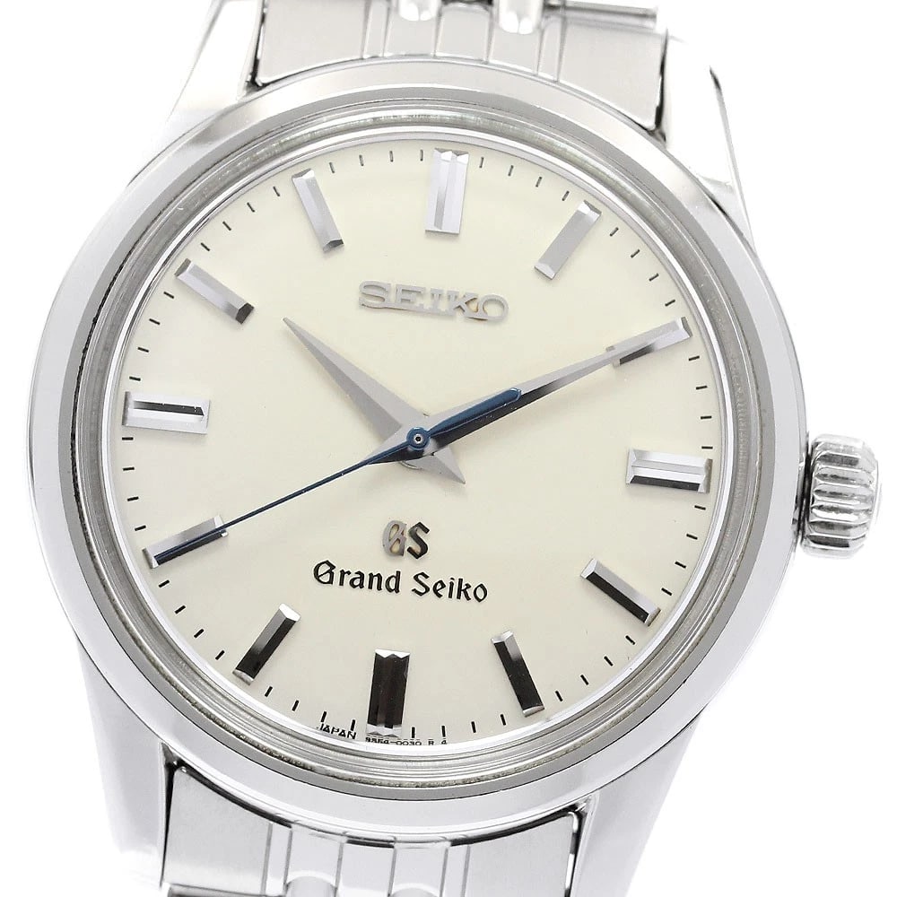 SEIKO GRAND BEIGE HAND WINDING WATCH: SEIKO Grand beige Hand Winding Watch Brand: SEIKO Type/Style: Wristwatch Material: Band Material Stainless Steel, Case Material Stainless Steel Color: Dial Color beige Band Color Silver Case Color