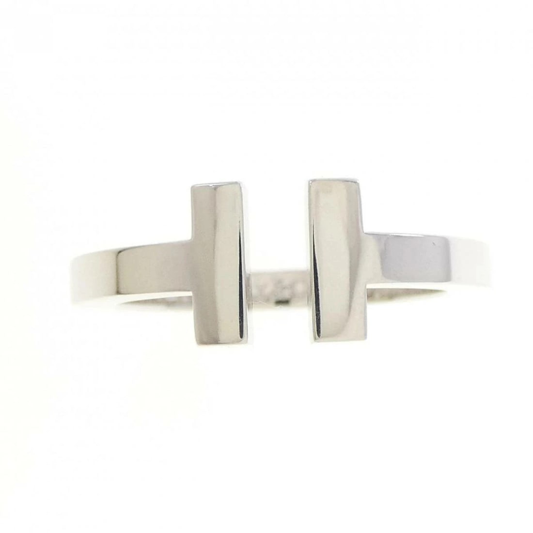 TIFFANY T SQUARE RING WHITE GOLD: Tiffany T Square Ring White Gold Brand: Tiffany & Co. Type/Style: Ring Material: White Gold Color: White Gold Size: US 7.25 Accessories: None Accessories Notice: When purchasing pre-owned goods,