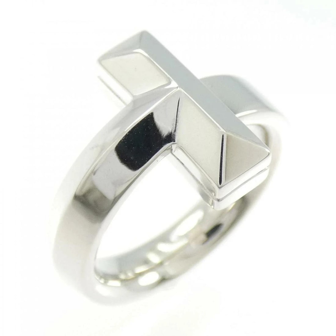 TIFFANY T ONE RING: Tiffany T One Ring Brand: Tiffany & Co. Type/Style: Ring Material: 750 White Gold Color: White Gold Size: US 5 Accessories: None Accessories Notice: When purchasing pre-owned goods, please