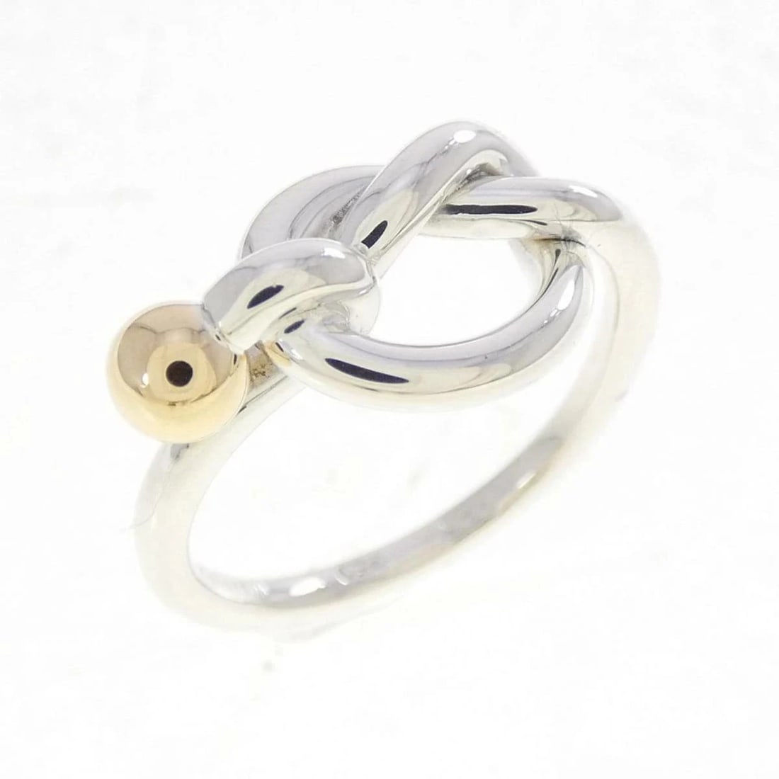 TIFFANY LOVE KNOT RING STERLING SILVER GOLD: Tiffany Love Knot Ring Sterling Silver Gold Brand: Tiffany & Co. Type/Style: Ring Material: Sterling Silver / Yellow Gold Color: YG,Silver Size: US 5 Accessories: None Accessories Notice: