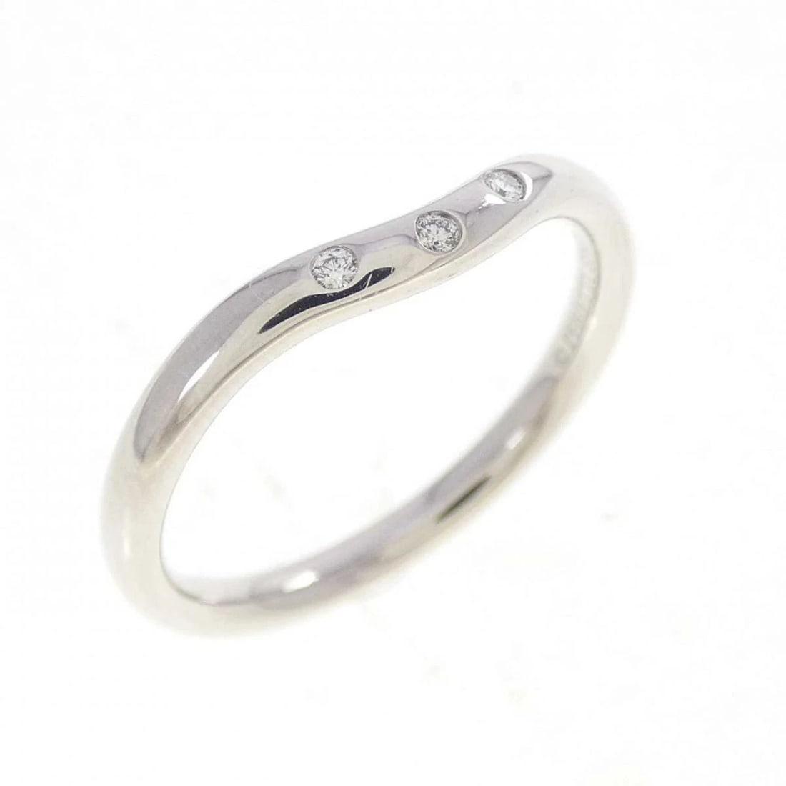 TIFFANY CURVED RING WHITE GOLD DIAMOND: Tiffany Curved Ring White Gold Diamond Brand: Tiffany & Co. Type/Style: Ring Material: 750 White Gold Color: White Gold Size: US 6.25 Accessories: None Accessories Notice: When purchasing