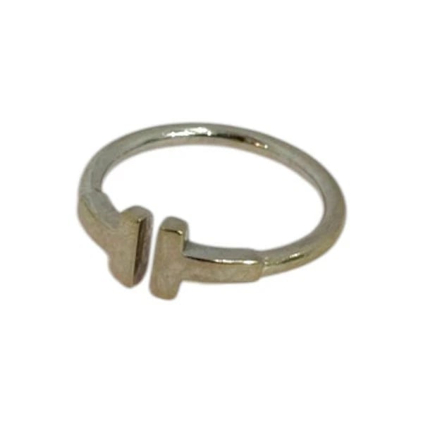 TIFFANY & CO. 750WG RING: Tiffany & Co. 750WG Ring Brand: Tiffany & Co. Type/Style: Ring Material: 750 White Gold (K18) Color: White Gold Size: US 4.5 to 5.5 Accessories: None Accessories Notice: When purchasing pr