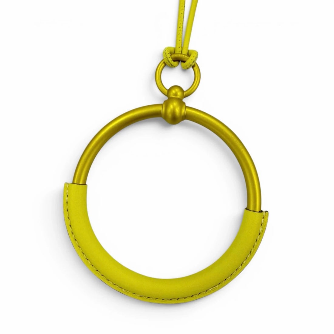 HERMES LOOP GRAND LEATHER PENDANT NECKLACE YELLOW: Hermes Loop Grand Leather Pendant Necklace Yellow Brand: Hermes Type/Style: Necklace Material: Leather (partially) Color: Yellow Size: Top length approximately 3.5 inches, width approximately 2.8