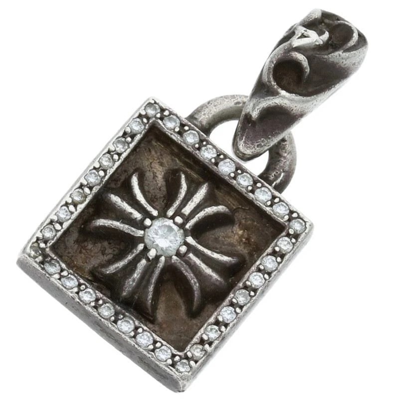 CHROME HEARTS SILVER PAVE DIAMOND CHARM: Chrome Hearts Silver PAVE Diamond Charm Brand: Chrome Hearts Type/Style: charm Material: Sterling Silver Color: Silver, Clear Size: Width 0.5 in, Height 1.0 in Accessories: None Accessories Notice: