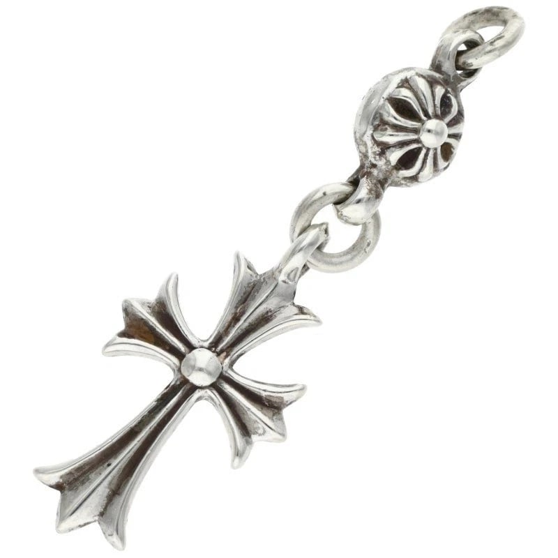 CHROME HEARTS SILVER CROSS NECKLACE: Chrome Hearts Silver Cross Necklace Brand: Chrome Hearts Type/Style: Necklace Material: Not specified Color: Silver Size: Dimensions 1.7 inches wide, 5.5 inches tall. Accessories: None Acc