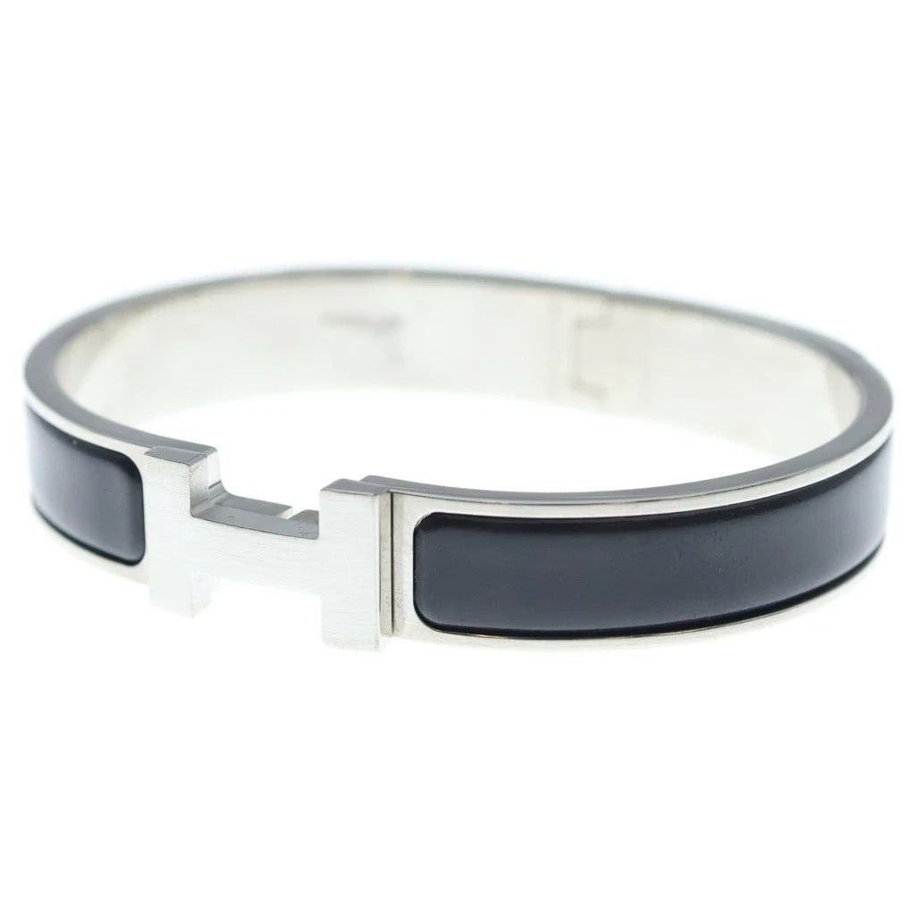 HERMES CLICK H ENAMEL BANGLE BRACELET BLACK/SILVER: Hermes Click H Enamel Bangle Bracelet Black/Silver Brand: Hermes Type/Style: Bracelet Material: Not specified Color: Black, Silver Size: Length 7.1 inches, Width 0.46 inches Accessories: None