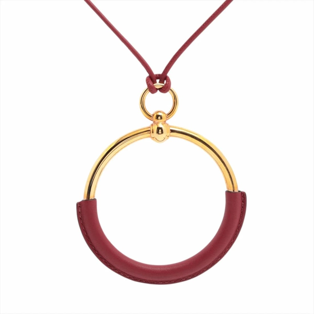 HERMES LOOP GRAND PENDANT NECKLACE: Hermes Loop Grand Pendant Necklace Brand: Hermes Type/Style: Necklace Material: GP Leather Color: Bordeaux, Gold Size: Chain length approximately 78 cm Accessories: None Accessories Notice