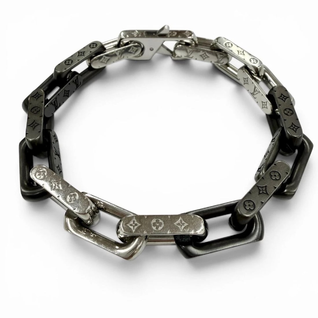 LOUIS VUITTON MONOGRAM CHAIN BRACELET: Louis Vuitton Monogram Chain Bracelet Brand: Louis Vuitton Type/Style: Bracelet Material: Material Color: Silver, Black Size: Chain Bracelet 7.5 in Accessories: None Accessories Notice: Wh
