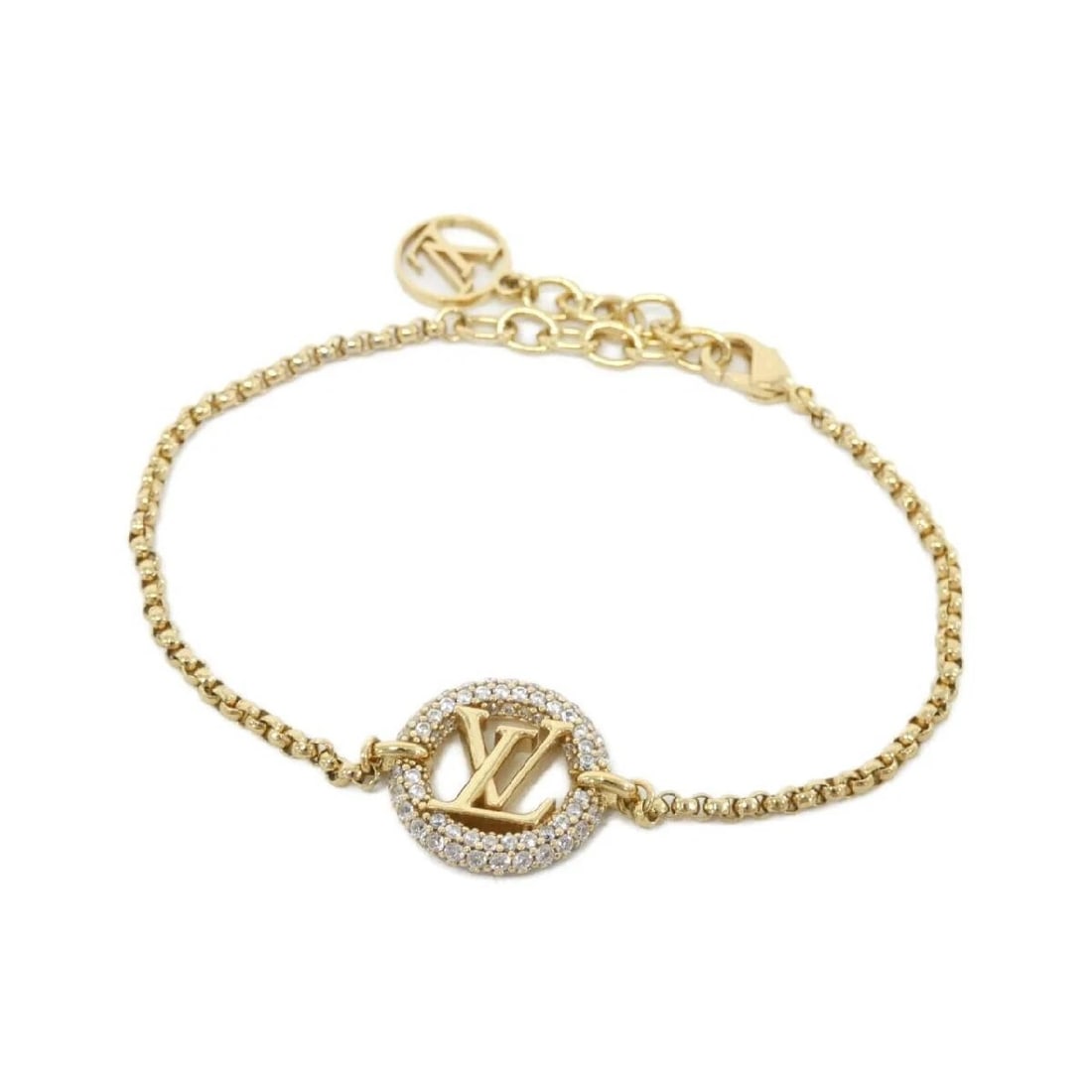 LOUIS VUITTON BRASSERIE LOUISE BRACELET: Louis Vuitton Brasserie Louise Bracelet Brand: Louis Vuitton Type/Style: Bracelet Material: Leather Color: Gold Size: Length 6.3-7.7 in, Motif 0.7 x 0.6 in Accessories: None Accessories No