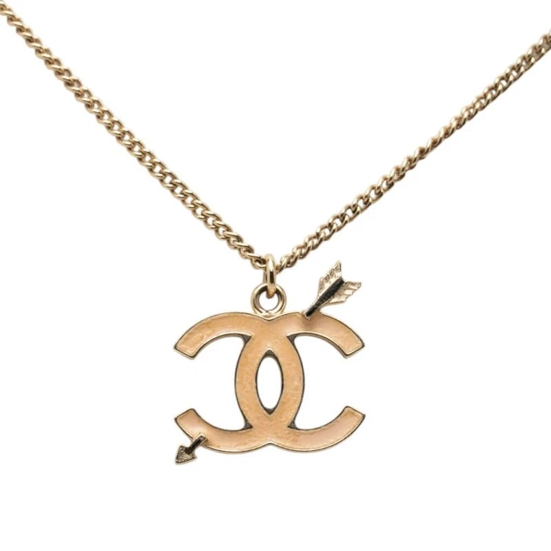 CHANEL NECKLACE GOLD BEIGE PLATED: CHANEL Necklace Gold Beige Plated Brand: CHANEL Type/Style: Necklace Material: Not specified Color: Gold, Beige Size: Total length approximately 16.9 inches, Pendant W approximately 0.8 inches x H