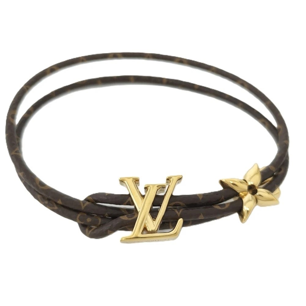 LOUIS VUITTON BLOOM MONOGRAM BRACELET: Louis Vuitton Bloom Monogram Bracelet Brand: Louis Vuitton Type/Style: Bracelet Material: Leather Color: none Size: measuring approximately 0.6 x 0.6 inches,wrist circumference of about 7.9 inches
