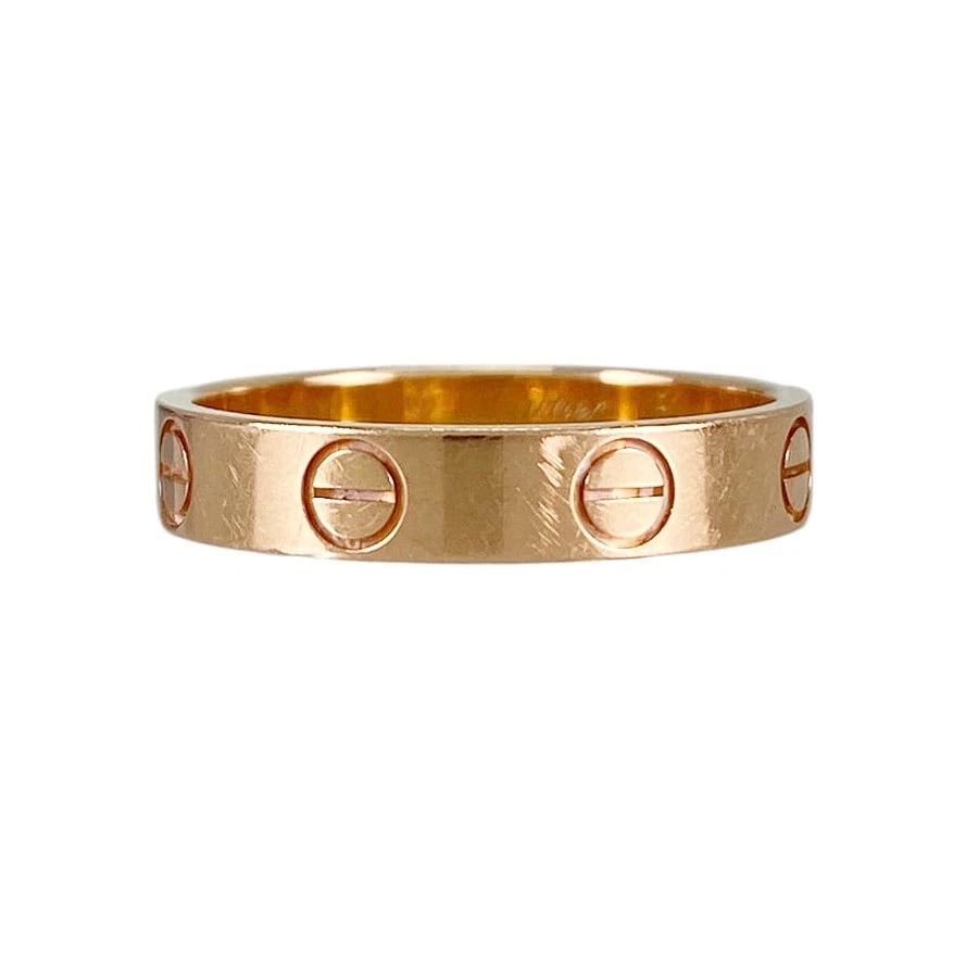 CARTIER MINI LOVE ROSE GOLD RING: Cartier Mini Love Rose gold Ring Brand: Cartier Type/Style: Ring Material: 18K Pink Gold Color: Rose Gold Size: 5.5 US Accessories: None Accessories Notice: When purchasing pre-owned goods