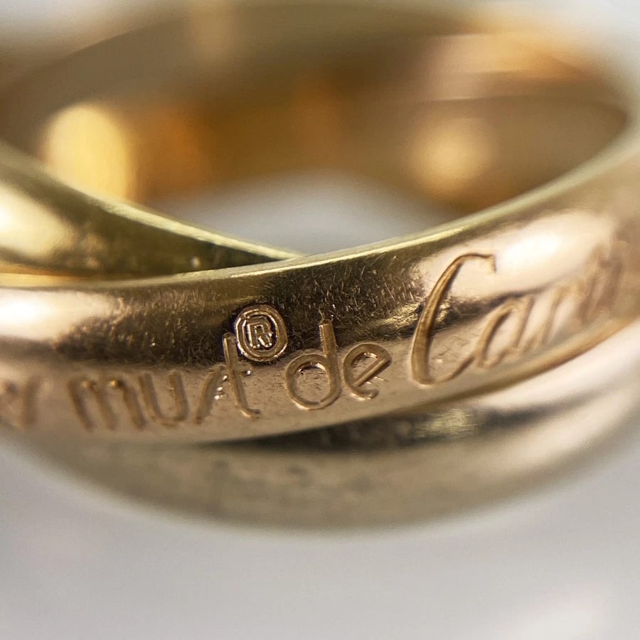 CARTIER TRINITY MM YELLOW GOLD RING: Cartier Trinity MM Yellow gold Ring Brand: Cartier Type/Style: Ring Material: 18K Yellow Gold 18K White Gold 18K Rose Gold Color: Gold Size: 5.5 US Accessories: None Accessories Notice: Wh