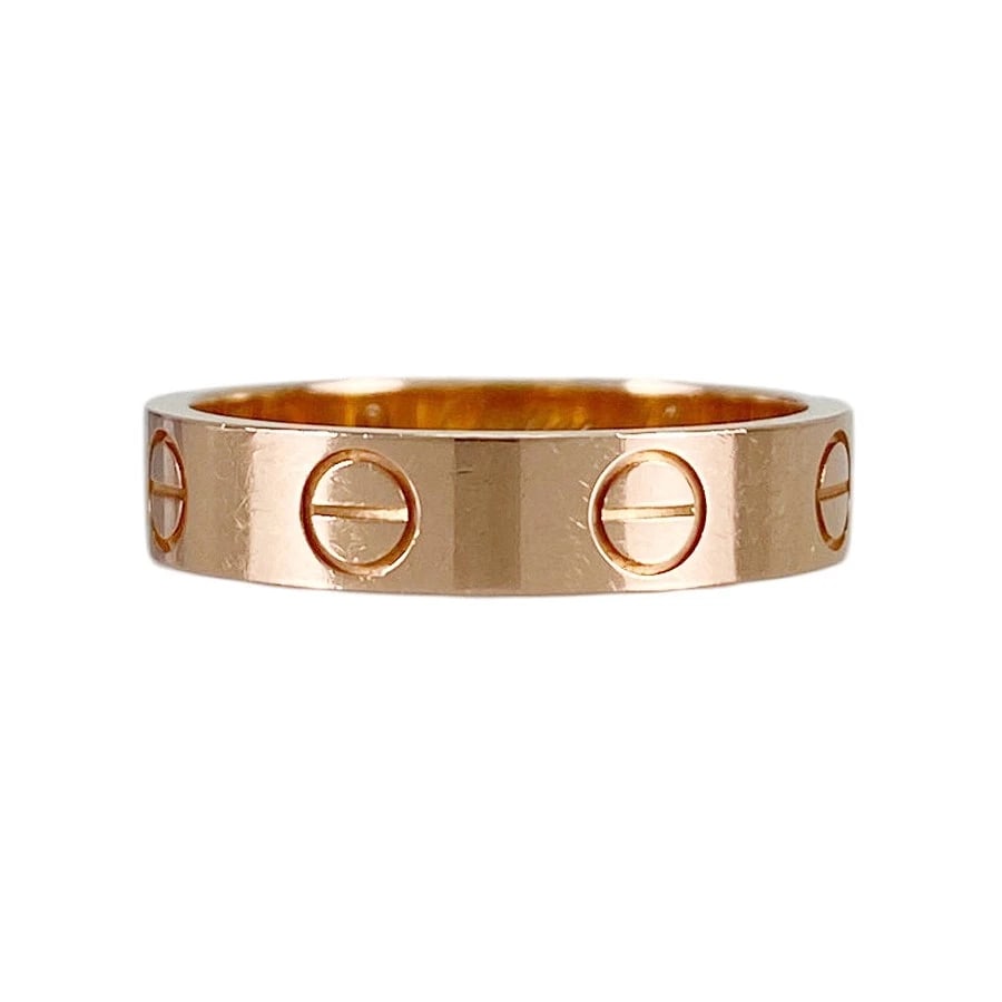 CARTIER MINI LOVE ROSE GOLD RING: Cartier Mini Love Rose gold Ring Brand: Cartier Type/Style: Ring Material: 18K Rose Gold Color: Gold Size: 4 US Accessories: None Accessories Notice: When purchasing pre-owned goods, pleas